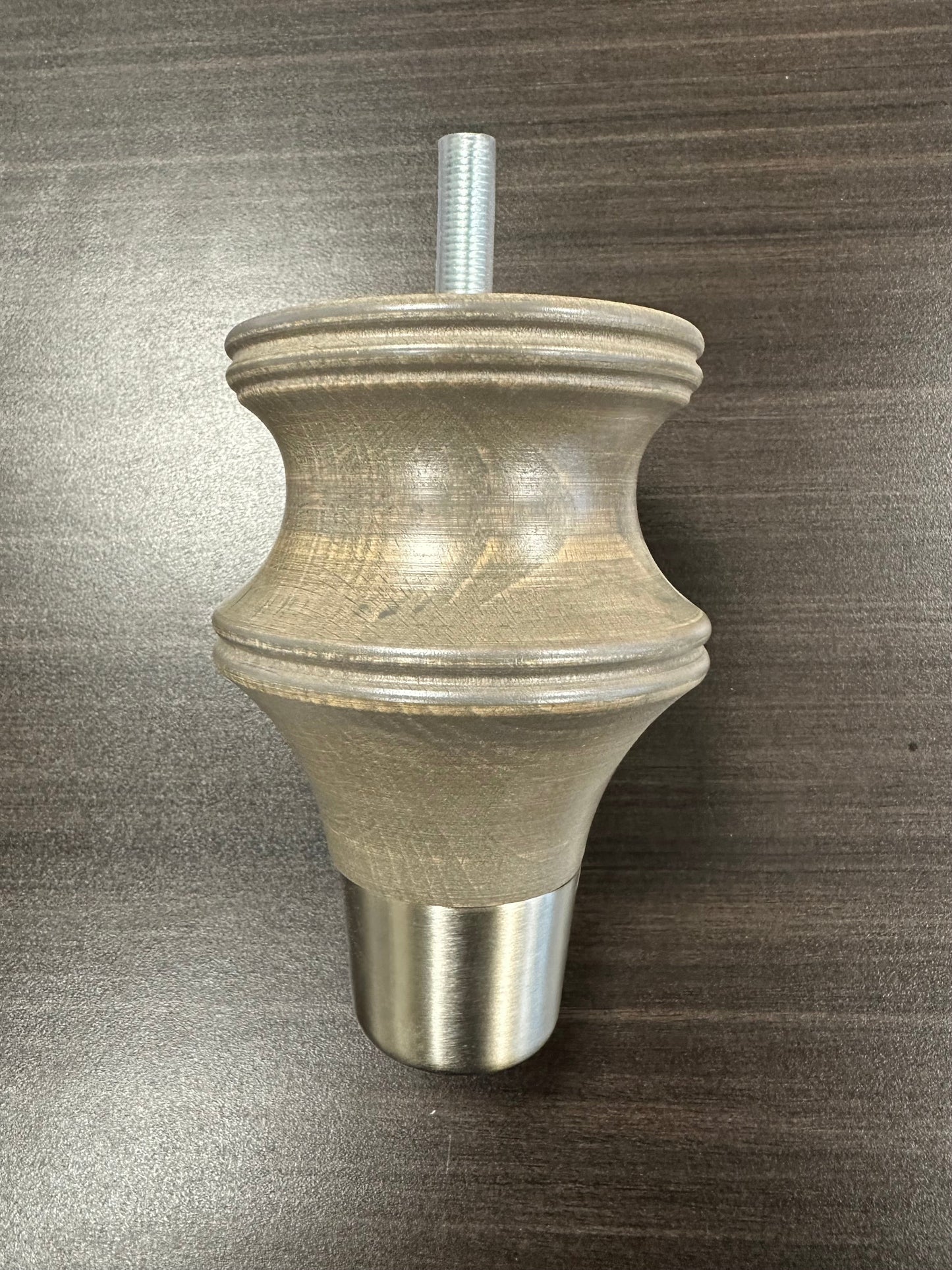 Grey wooden leg silver cap