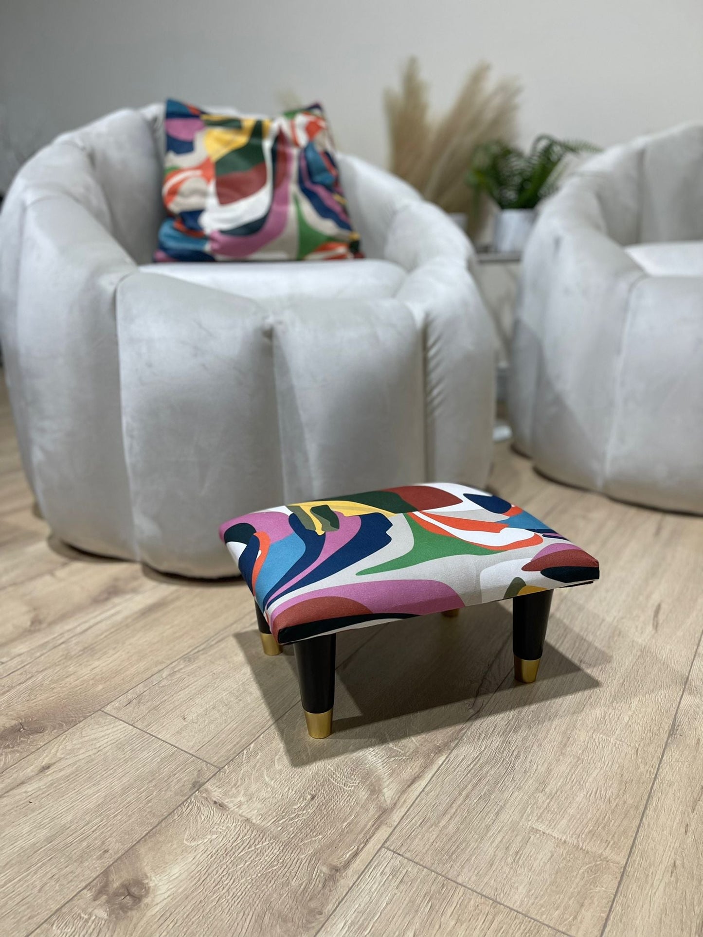 Small multi colour footrest pouffe