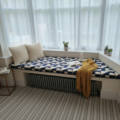 Bespoke 3-piece angled bay window cushion set installed on an indoor seating area