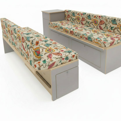 Bespoke floral pattern campervan cushions and dining seating area inside a motorhome