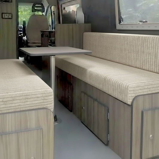 Bespoke linear pattern campervan dinette seating area with custom upholstery