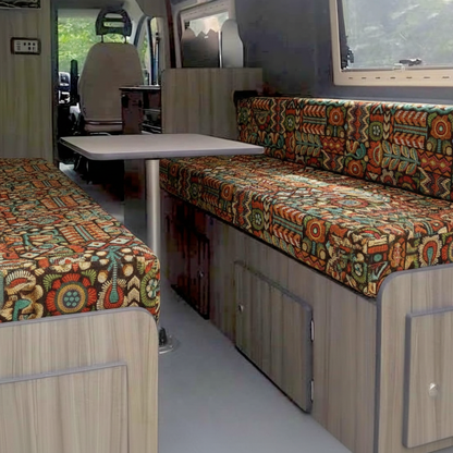 Bohemian tribal Aztec Campervan cushions interior-Heavyweight Tapestry Style Upholstery on dining seats-Eclectic boho van seating with orange and teal pattern-High density foam cushions with woven gobelin design-Nomadic style camper conversion with textured fabric
