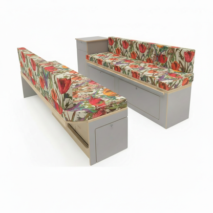 Vibrant floral Campervan seat covers in a conversion van-Custom foam pads with red tulip pattern for motorhomes-DIY van conversion cushions fitted on wooden bench-Close up of patterned Leisure vehicle upholstery fabric-Bright floral interior design for campervan renovation
