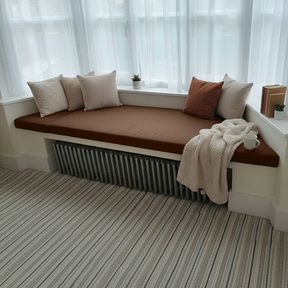 Chocolate bespoke upholstery cushions styled in cosy reading nook