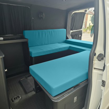 Close-up of high density foam covered with Teal durable fabric