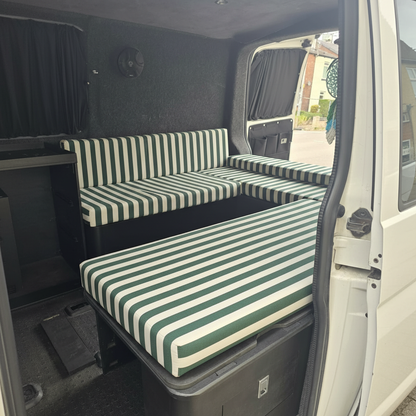 Custom made to measure van cushions with green and cream stripes on a slide out bed system
