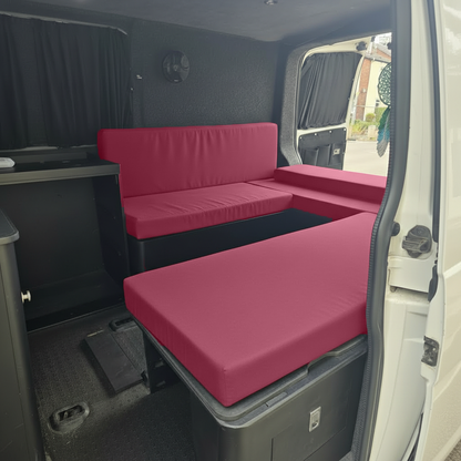 Deep maroon fabric in bespoke campervan conversion interior
