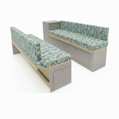 High-density caravan seating foam with modern fabric cover- Motorhome reupholstery interior with blue and green leaf design-Made-to-measure camper upholstery fitted in conversion van-Durable fabric texture for Motorhome bespoke furnishings

