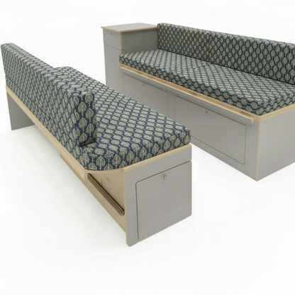 Luxury navy blue damask Campervan cushions interior-Elegant Block Print Style Upholstery on dining bench-Deep blue patterned motorhome seating with light wood-High density foam cushions with leaf motif-Sophisticated campervan conversion interior design