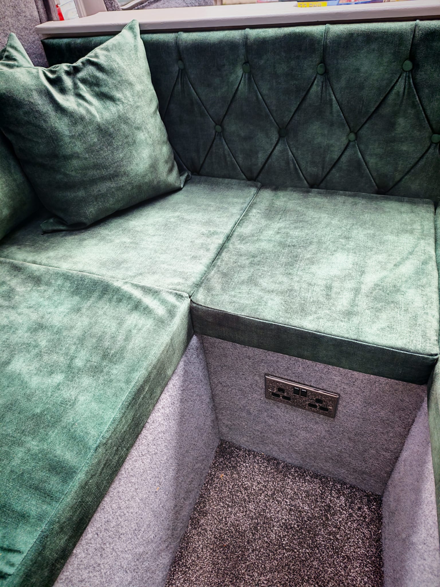 Full U-shape campervan lounge upholstered with a rich hue handcrafted cushion set