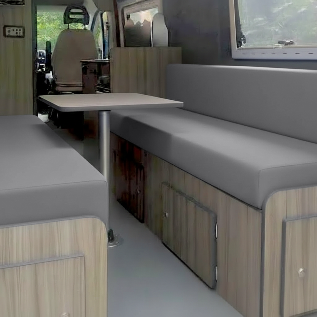 Grey campervan upholstery on rock and roll bed
