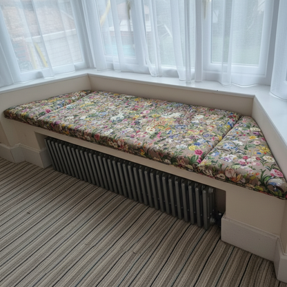 Handcrafted 3-piece angled bay window cushion set creating a luxurious interior seating area