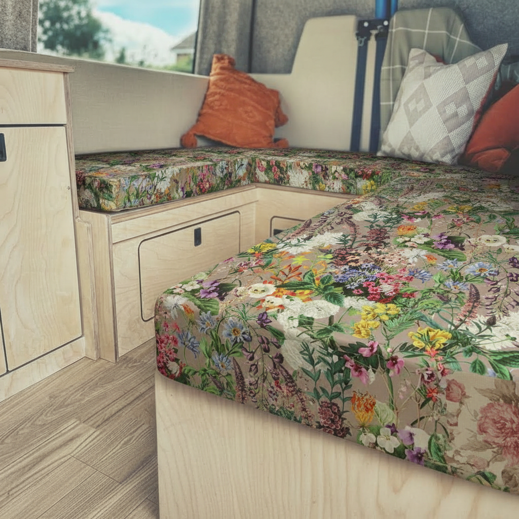 Pastel wildflower meadow Campervan cushions in bright interior-English Country Garden Style Upholstery on dining seats-Shabby chic floral motorhome seating with linen texture-High density foam cushions for cottagecore van conversion-Romantic soft floral fabric for leisure vehicles