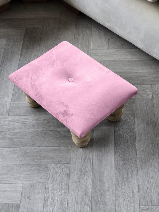 Small pink footrest pouffe