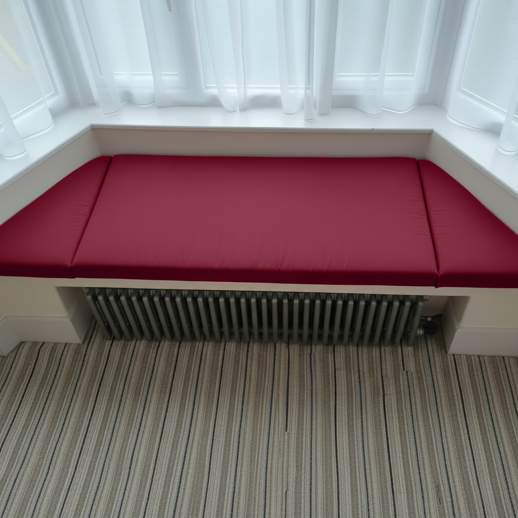 Interior design showcasing a reading nook with bespoke upholstery