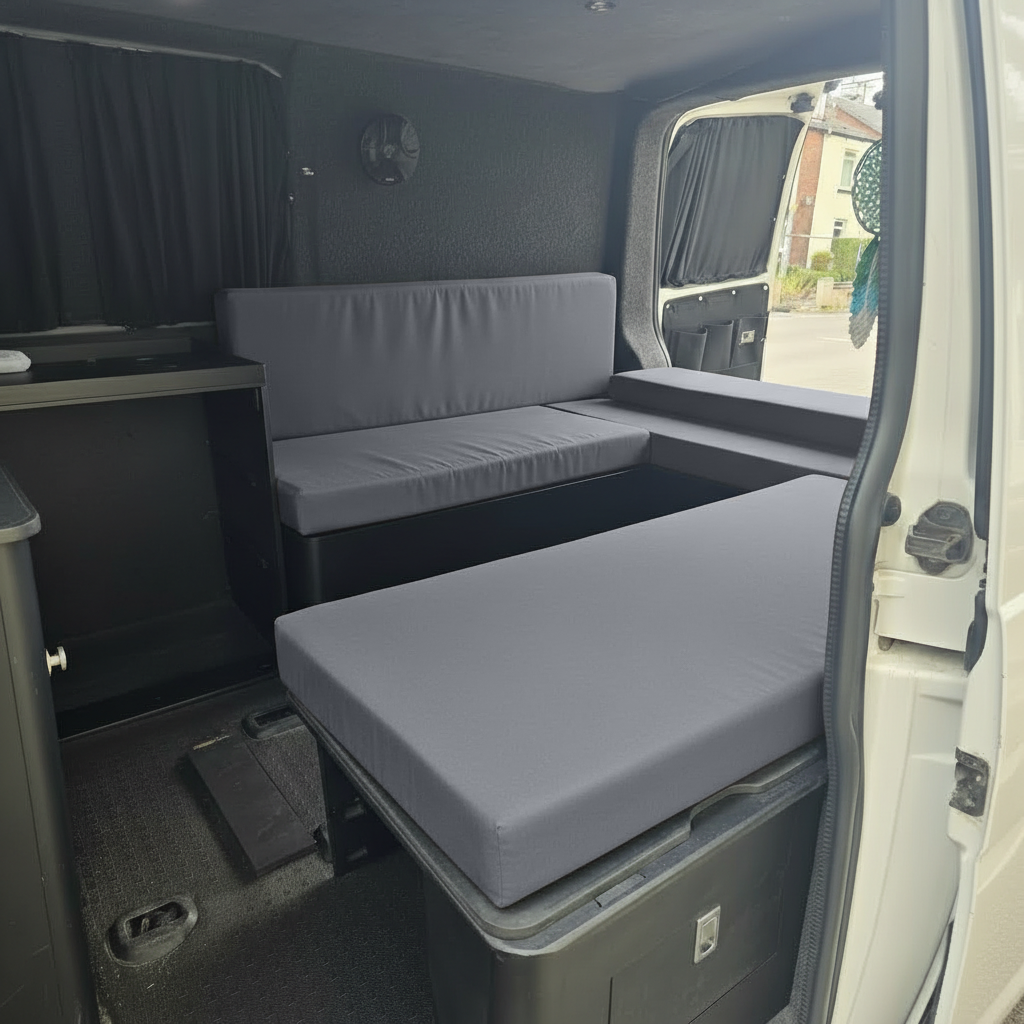 Interior van life setup featuring Dark Grey motorhome upholstery
