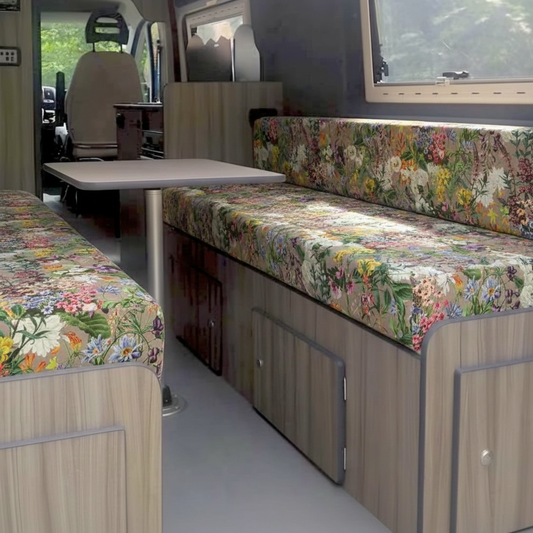 Pastel wildflower meadow Campervan cushions in bright interior-English Country Garden Style Upholstery on dining seats-Shabby chic floral motorhome seating with linen texture-High density foam cushions for cottagecore van conversion-Romantic soft floral fabric for leisure vehicles
