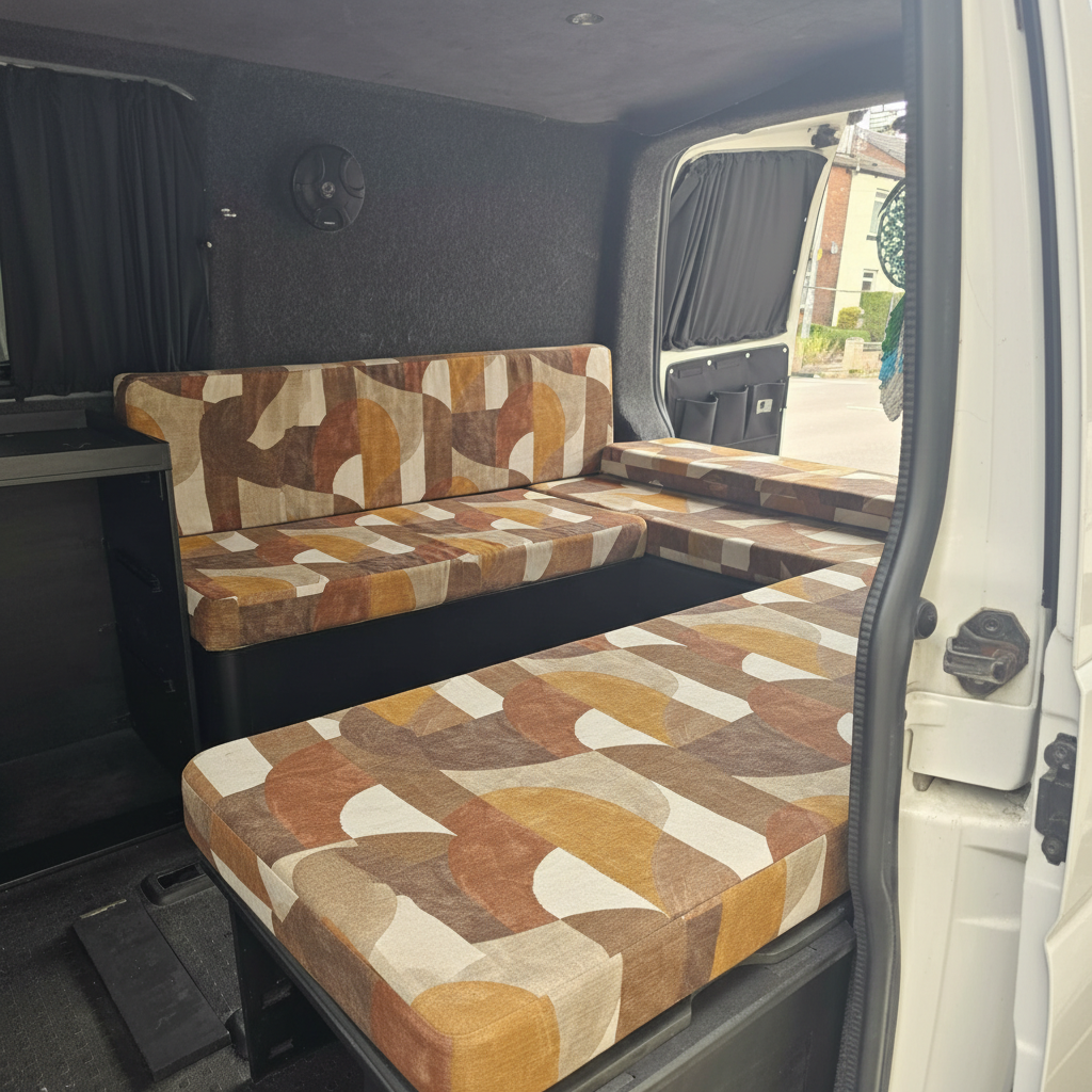 Retro Earth geometric pattern bespoke campervan cushion seating-Premium mustard and terracotta motorhome cushions with 70s design-Custom made to measure campervan bed cushion UK-Handcrafted abstract motorhome seating and replacement cushions-High quality caravan cushion seating with warm earth tones
