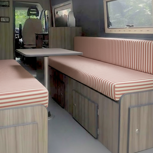 Rustic red ticking stripe Campervan cushions interior-French Farmhouse Style Upholstery on dining bench seats-Vintage pinstripe motorhome seating in red and cream-High density foam cushions with fine ticking stripe-Country kitchen style camper conversion design
