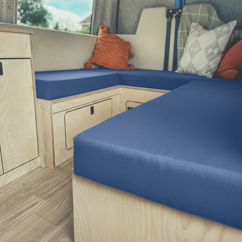 Side view of royal blue van seat pad showing foam thickness