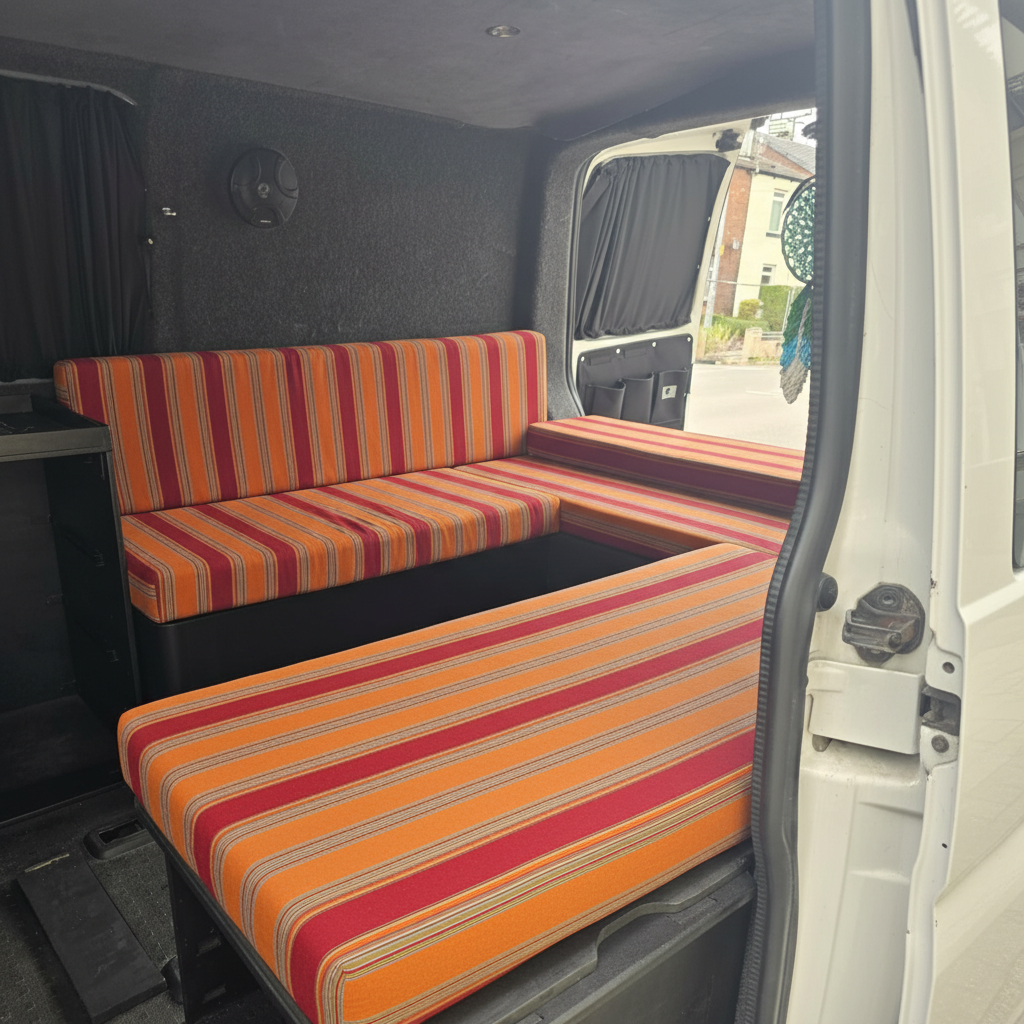 Sunset Stripe pattern bespoke campervan cushion seating-Premium orange and red motorhome cushions with striped design-Custom made to measure campervan bed cushion UK-Handcrafted modern motorhome seating and replacement cushions-High quality caravan cushion seating with vibrant linear print