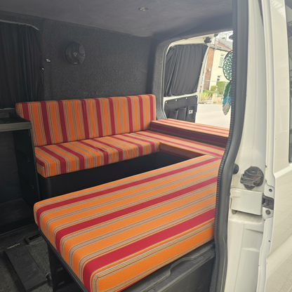 Sunset Stripe pattern bespoke campervan cushion seating-Premium orange and red motorhome cushions with striped design-Custom made to measure campervan bed cushion UK-Handcrafted modern motorhome seating and replacement cushions-High quality caravan cushion seating with vibrant linear print