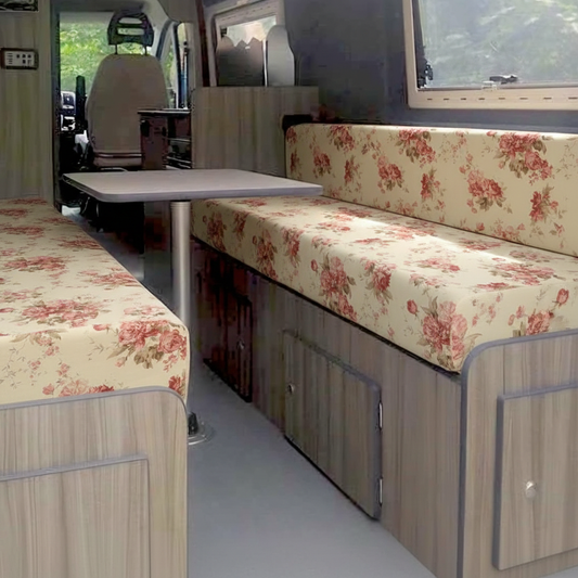 Vintage cream rose Campervan cushions in tea room style interior-Romantic Floral Chintz Upholstery on dining benches-Classic pink rose motorhome seating with cream background-High density foam cushions for grandmillennial van conversion-Nostalgic english cottage style camper fabric
